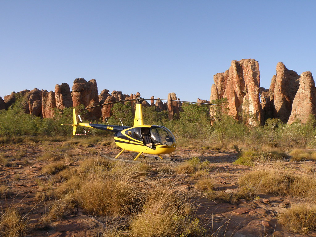 What is the availability of scenic flight tours during peak tourist seasons in Mount Kenya?