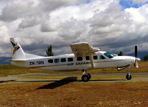 Can I request a narrated scenic flight to learn about Mount Kenya’s history?