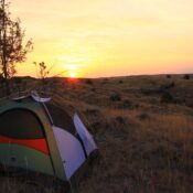 Can I camp during a multi-day rock climbing expedition in Mount Kenya?